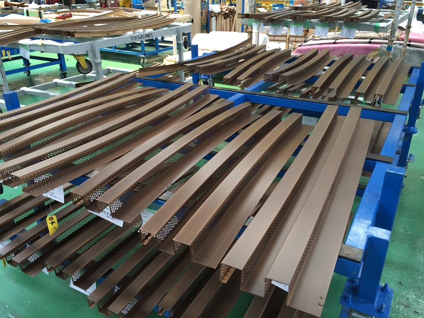 Rows of various R bent corrugated louvres