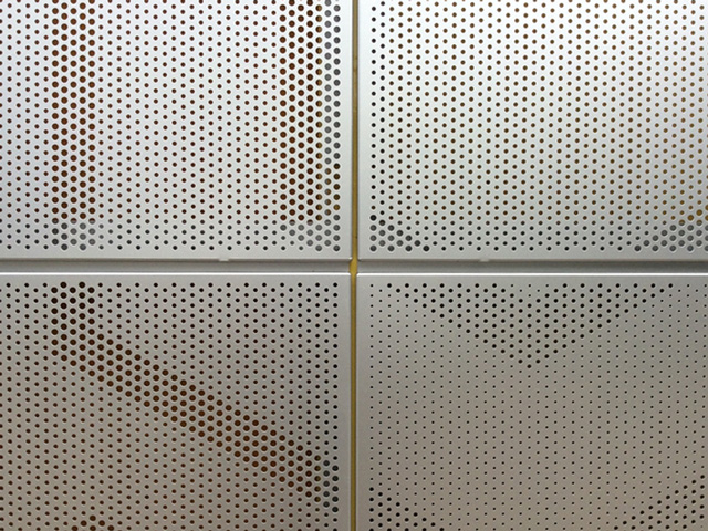 A designed perforation pattern, fabricated at Kikukawa