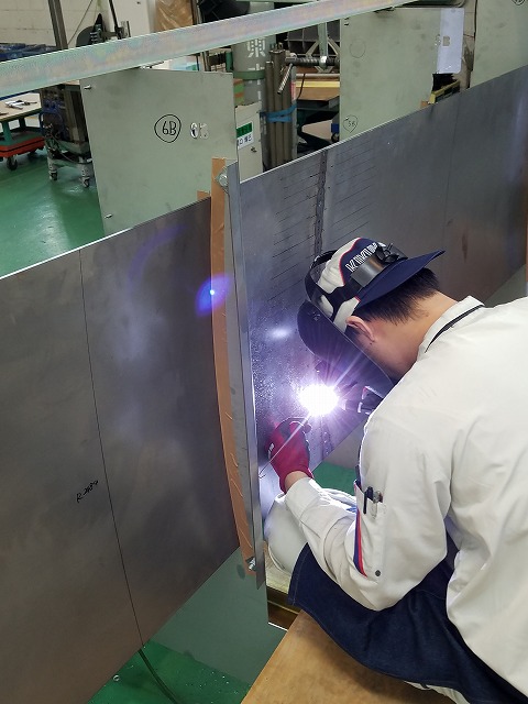 Welding the pieces upright to maintain their shapes. Welding this way requires expertise