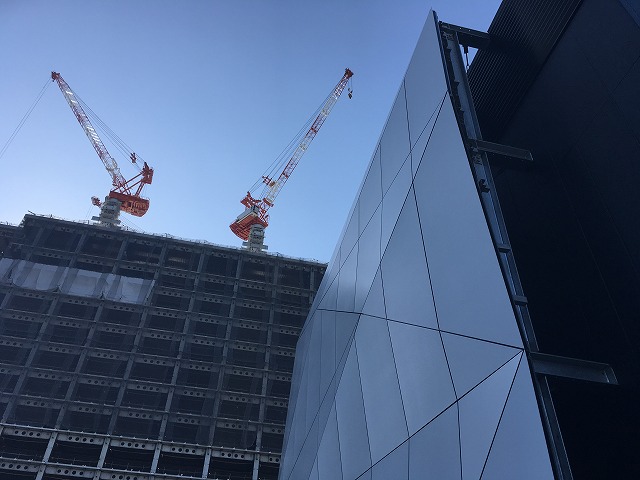 The gantry cranes in the distance give an idea of the size of the panels