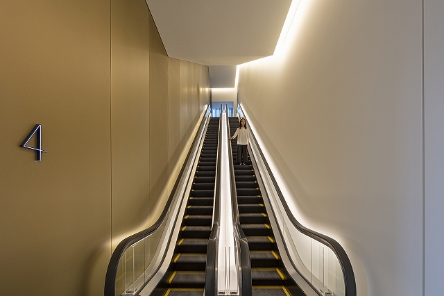 Bespoke brass wall panels, of over 4m, fabricated from bespoke brass alloys