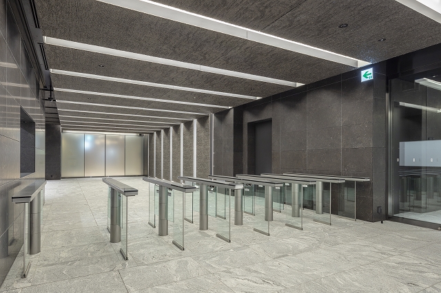 Die-casted aluminium panels line the entrance lobby
