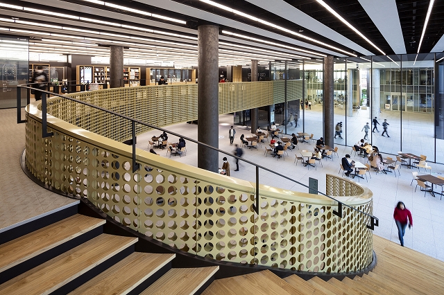 Layered perforated panels around the spiral staircase