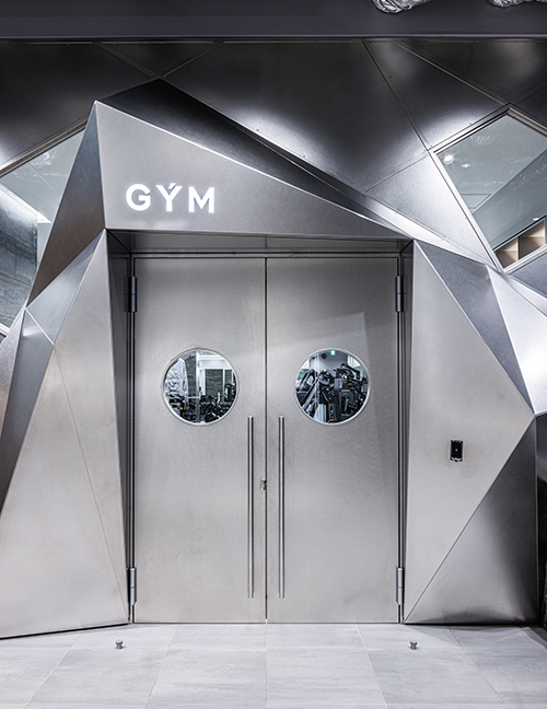 Entrance Crafted in Three-Dimensional Stainless Steel Panels